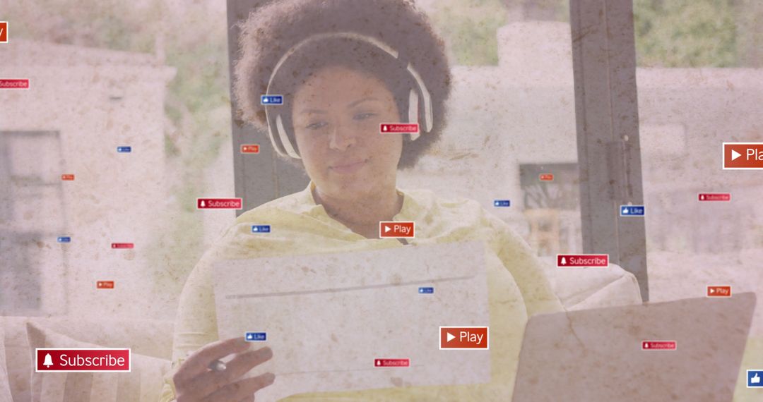 Woman Using Laptop and Papers with Interactive UI Elements at Home