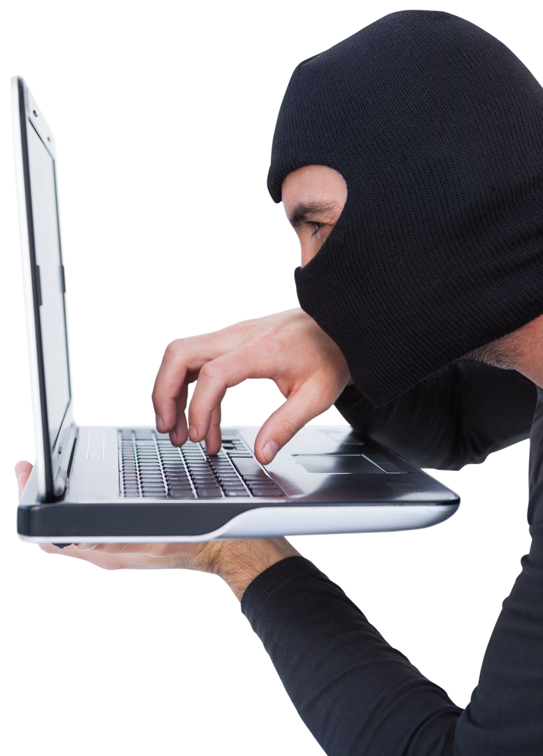 Transparent View of Burglar Wearing Balaclava on Laptop Typing Carefully - Download Free Stock Images Pikwizard.com