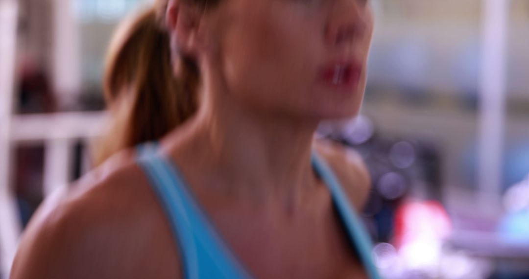 Focused Woman Running on Treadmill at Gym - Free Images, Stock Photos and Pictures on Pikwizard.com