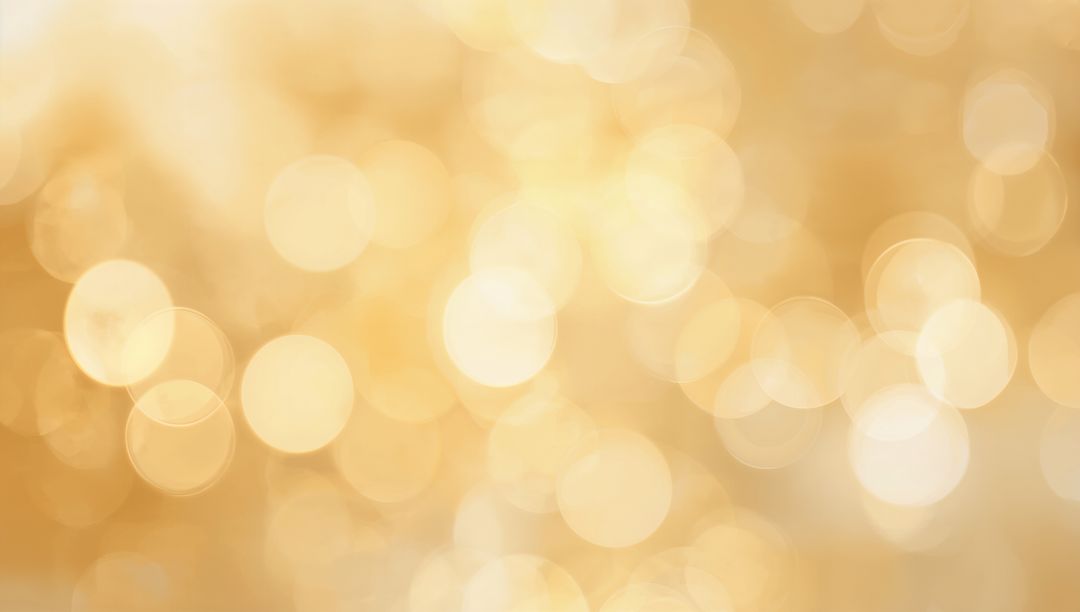 Glowing Golden Bokeh Background with Soft Amber Circles Creating Warm Festive Glow
