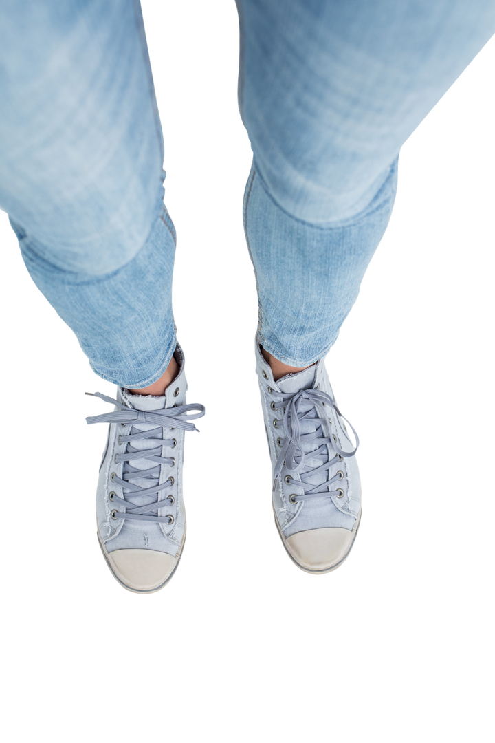 Top view of woman wearing casual grey trainers on transparent background - Download Free Stock Images Pikwizard.com