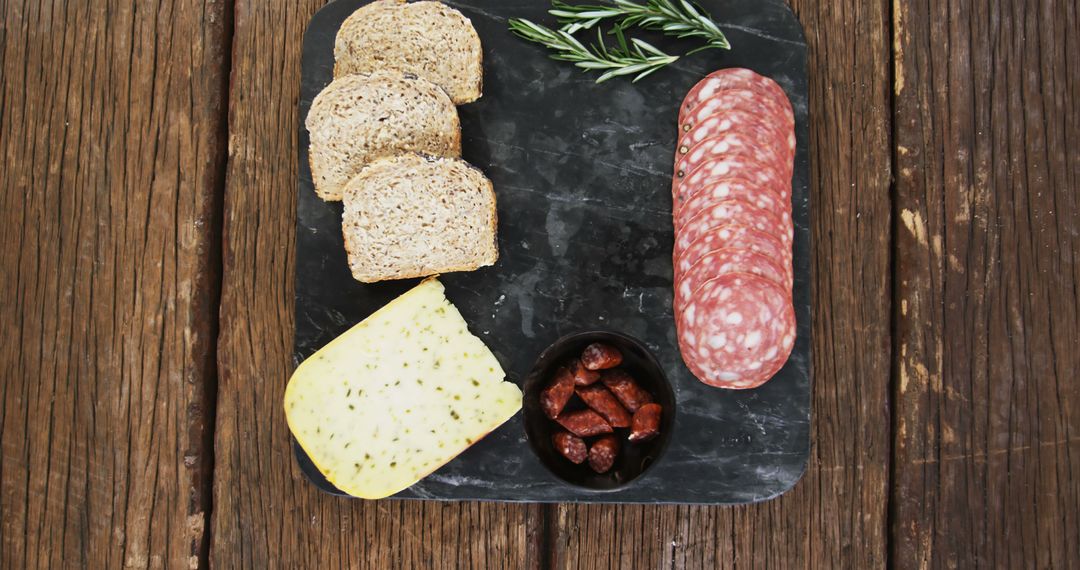 Rustic Charcuterie Board with Bread, Cheese, and Salami