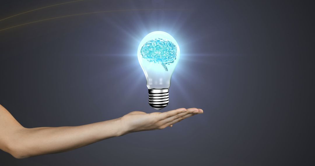 Innovative Brain Inside Light Bulb Hovering Over Hand