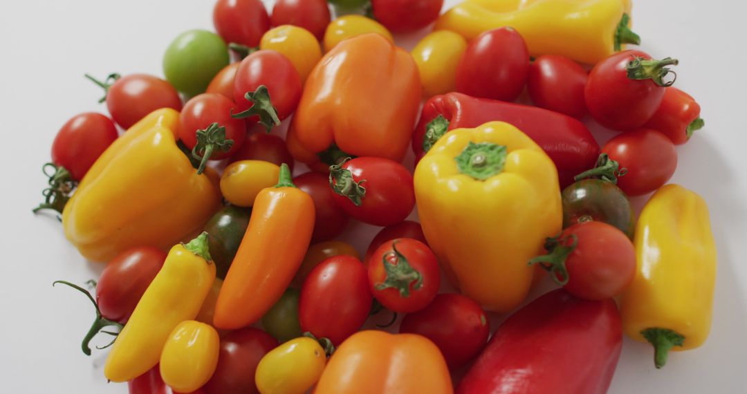 Vibrant Assortment of Colorful Peppers and Tomatoes