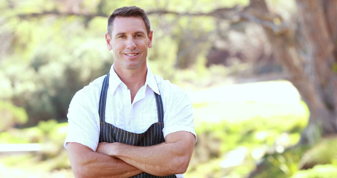 Confident Male Chef Standing Outdoors with Arms Crossed - Free Images, Stock Photos and Pictures on Pikwizard.com