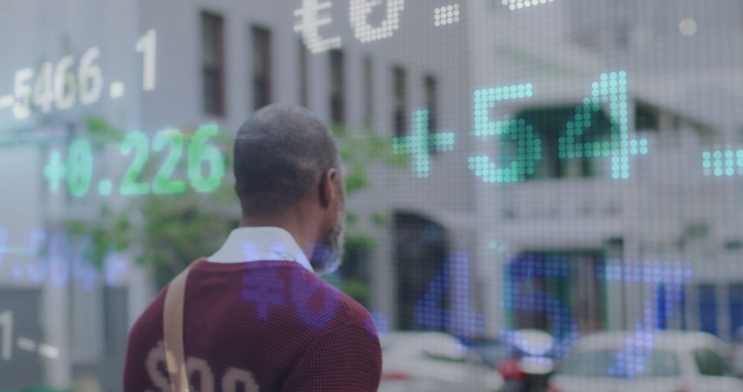 Businessman Analyzing Interactive Stock Market Projections