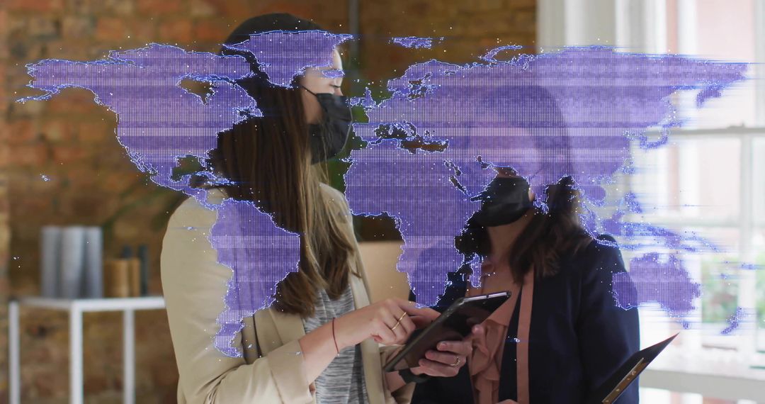 Colleagues Analyzing World Map Overlay on Tablet in Modern Office