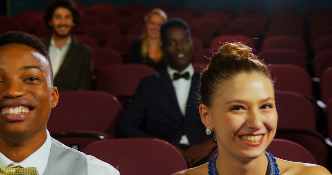 Enthusiastic Audience Awaiting Theater Performance