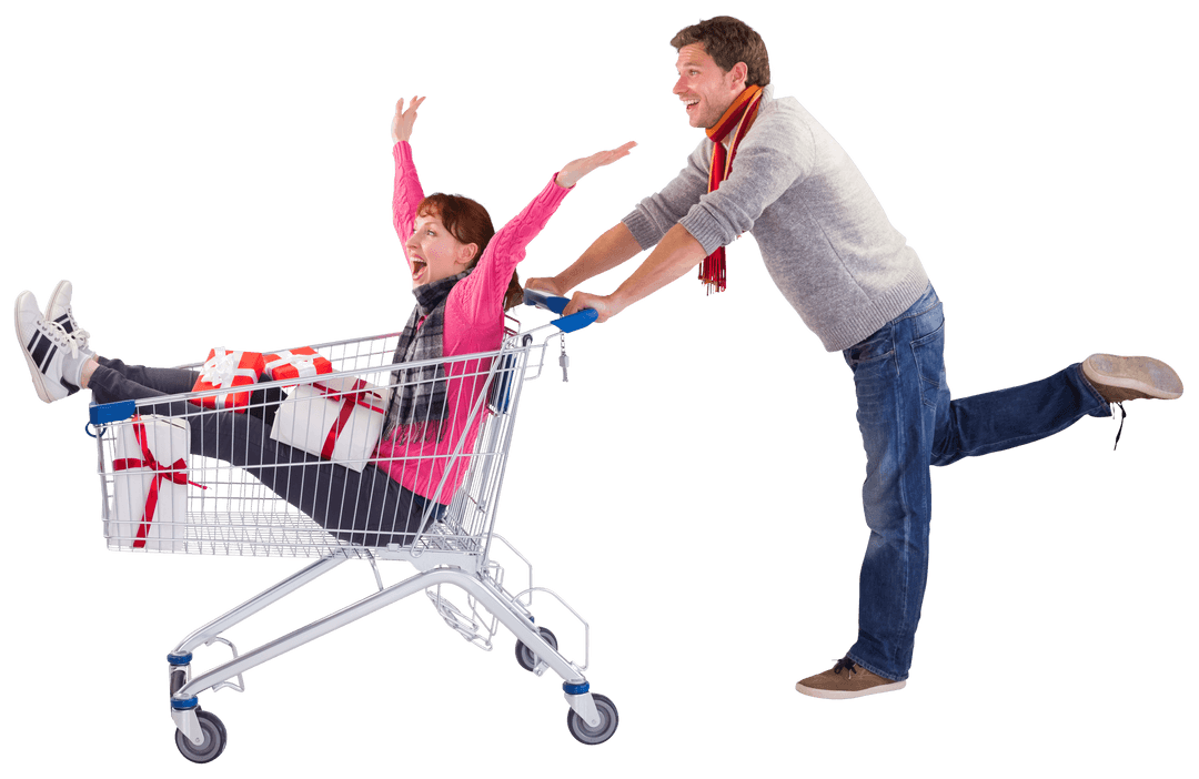 Playful Couple with Shopping Trolley Full of Gifts on Transparent Background