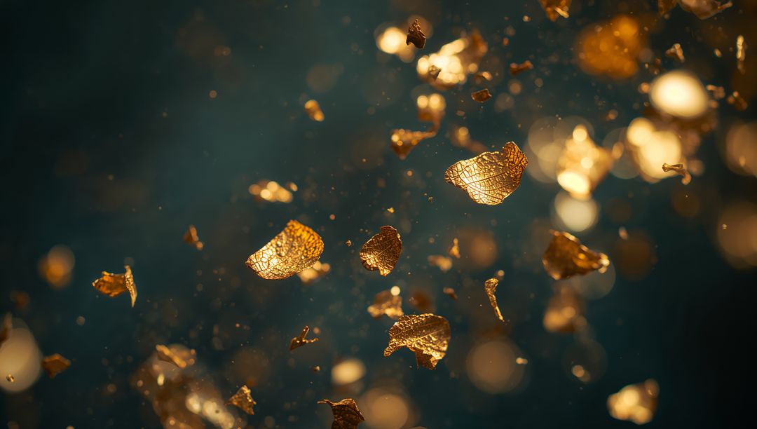 Floating Golden Leaf Skeletons and Metallic Flakes with Amber Bokeh on Teal Backdrop
