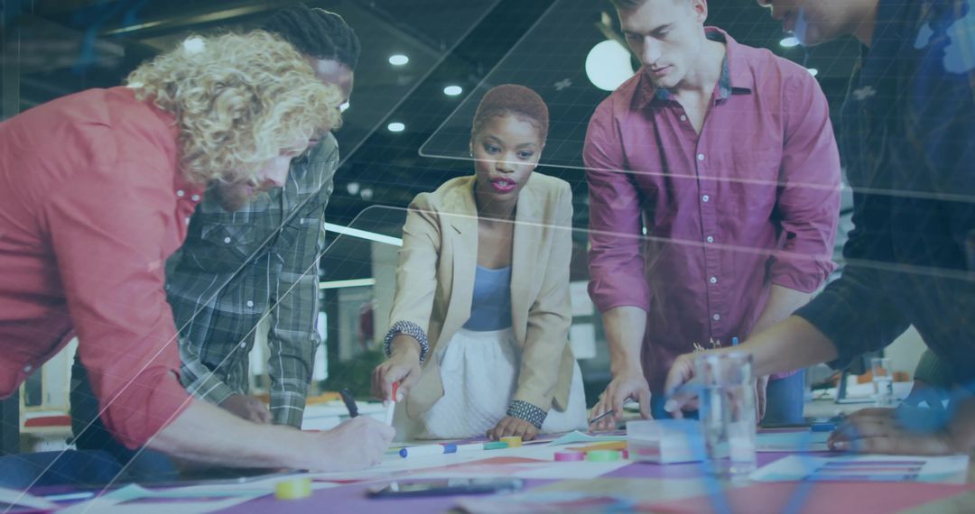 Diverse Team Brainstorming and Innovating at Office Workspace