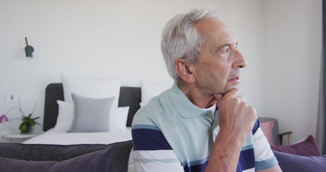 Elderly Man Reflecting at Home - Free Images, Stock Photos and Pictures on Pikwizard.com