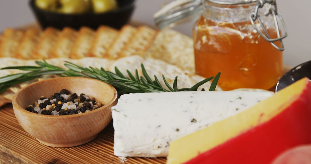 Delicious Cheese and Crackers Platter with Honey and Pepper Medley - Free Images, Stock Photos and Pictures on Pikwizard.com