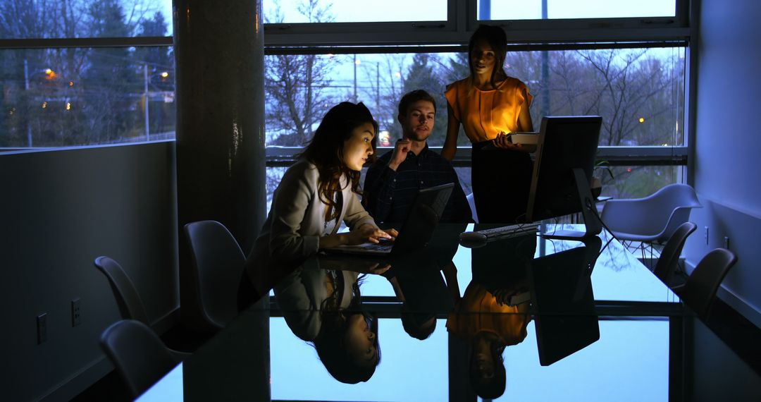 Team Working Late Night on Laptops in Office - Free Images, Stock Photos and Pictures on Pikwizard.com