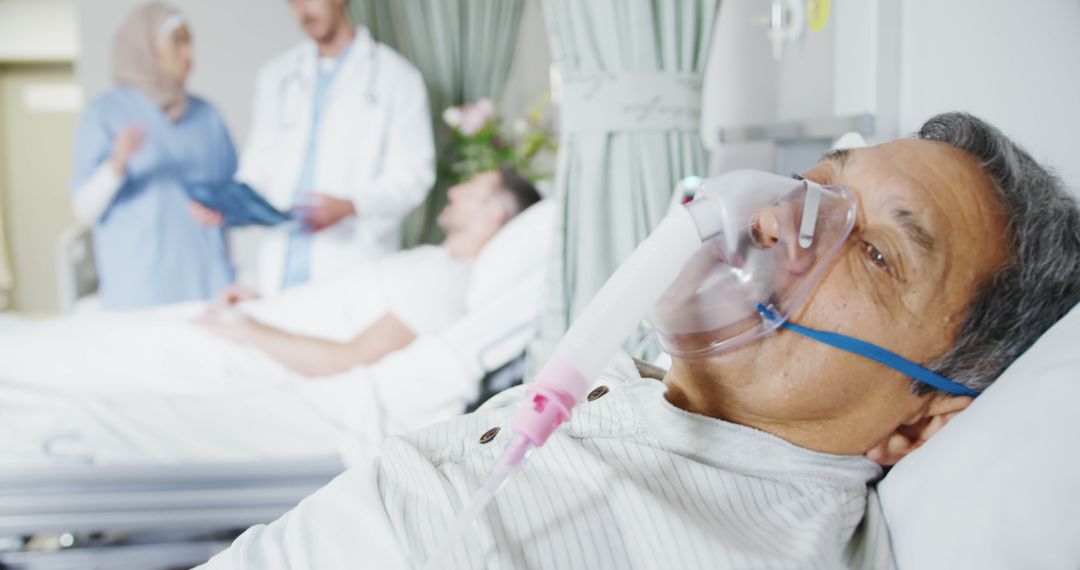 Elderly Man with Oxygen Mask in Hospital Bed - Free Images, Stock Photos and Pictures on Pikwizard.com