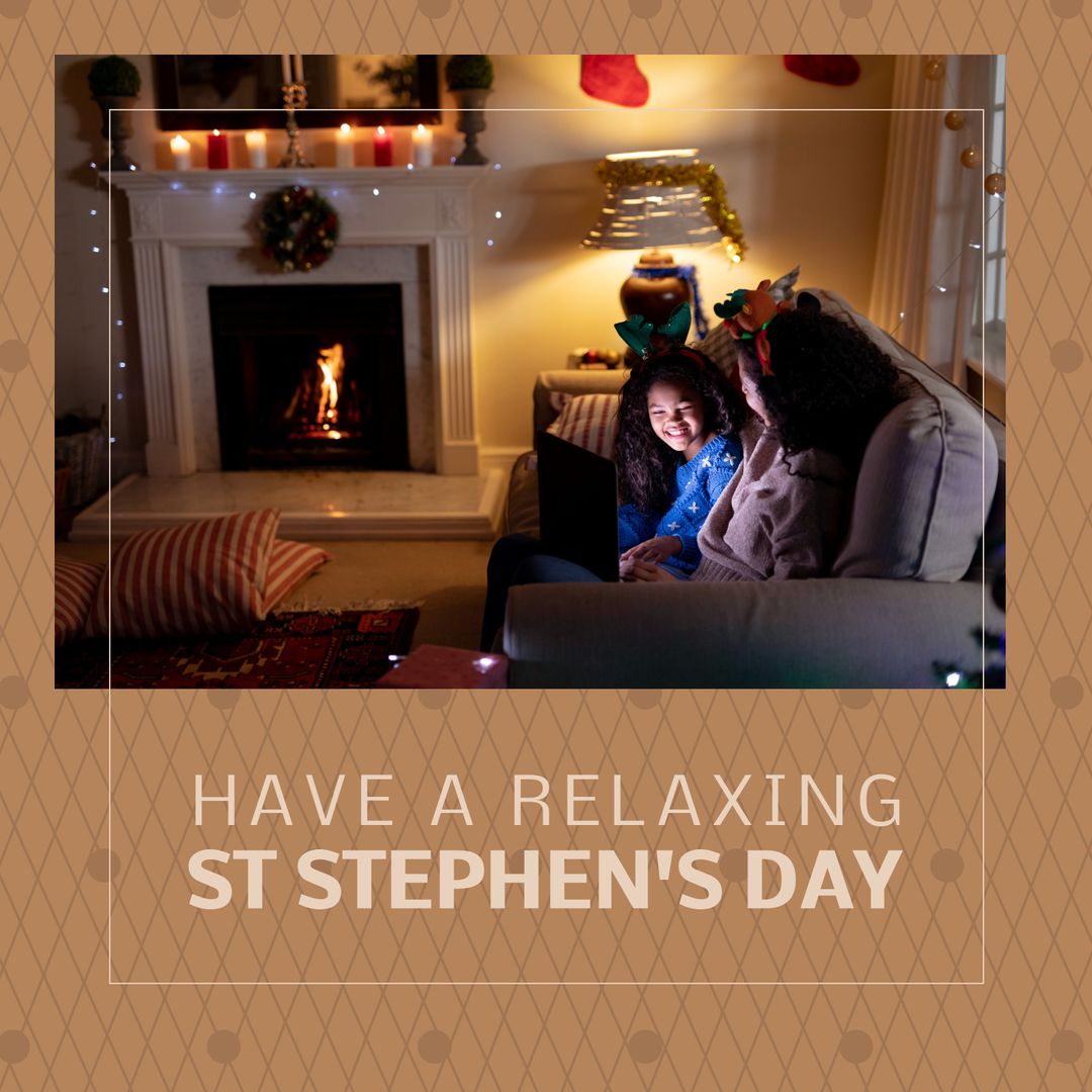 Biracial Mother and Daughter Enjoying Christmas by Fireplace on St Stephen's Day
