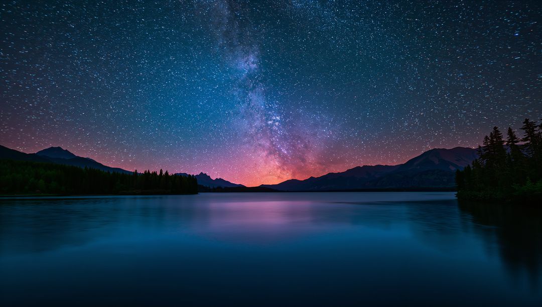 Milky Way Over Tranquil Mountain Lake at Night