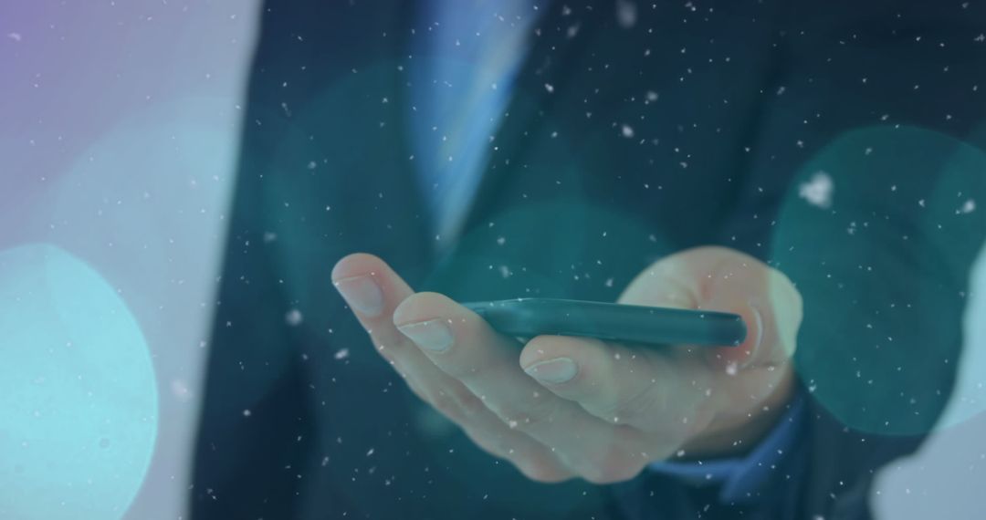 Businessman Using Smartphone with Digital Overlay and Snowfall Effect