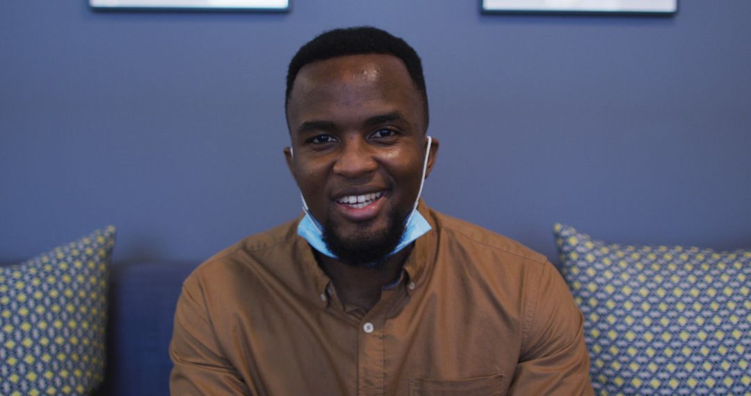 Smiling Man Social Distancing Relaxing at Home