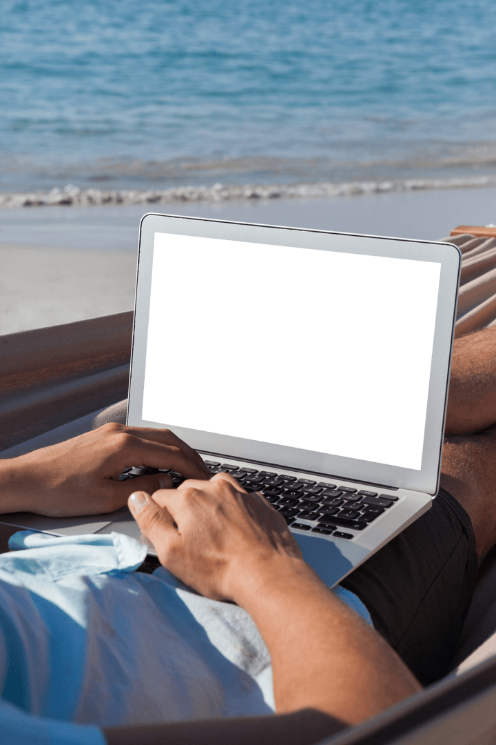 Relaxed Man with Transparent Screen Laptop on Beach Hammock