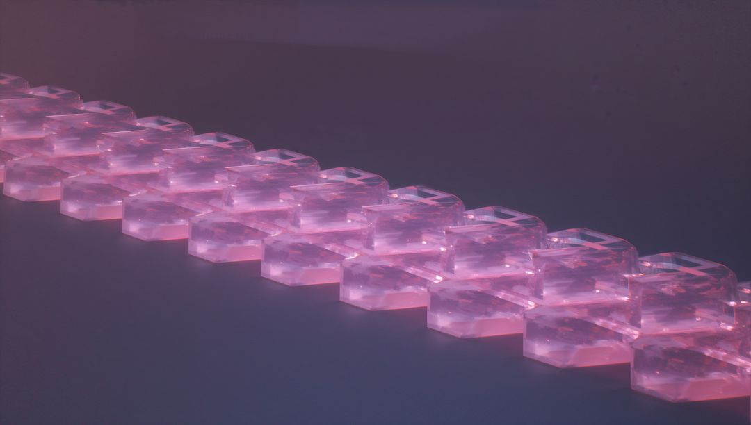Glowing Pink Hexagonal Prisms Align in Futuristic Display