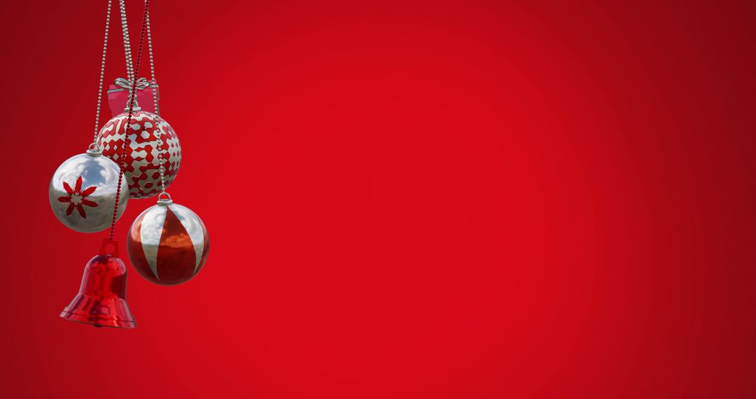 Silver and Red Christmas Ornaments on Vibrant Red Background