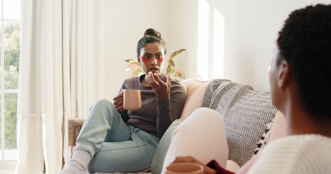 Women Relaxing with Coffee and Enjoyable Conversation