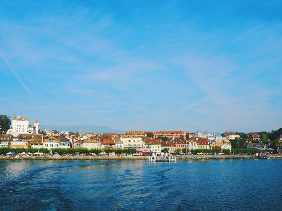 Scenic European Riverside Town with Clear Blue Skies - Free Images, Stock Photos and Pictures on Pikwizard.com