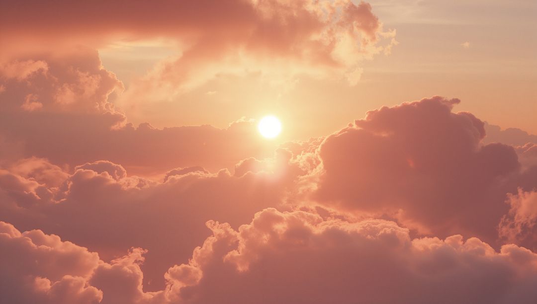 Peaceful Sunrise Over Fluffy Clouds with Pink Glow