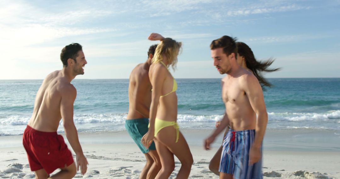 Group of Friends Dancing on Beach Enjoying Summer Vacation - Free Images, Stock Photos and Pictures on Pikwizard.com