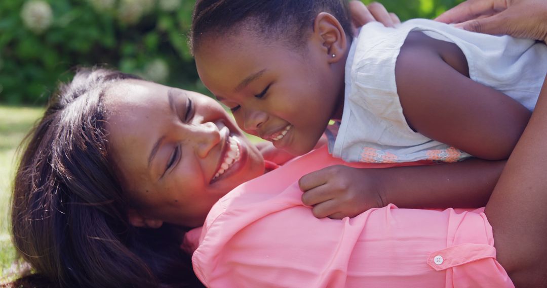 Joyful Bonding Between Mother and Daughter in Nature