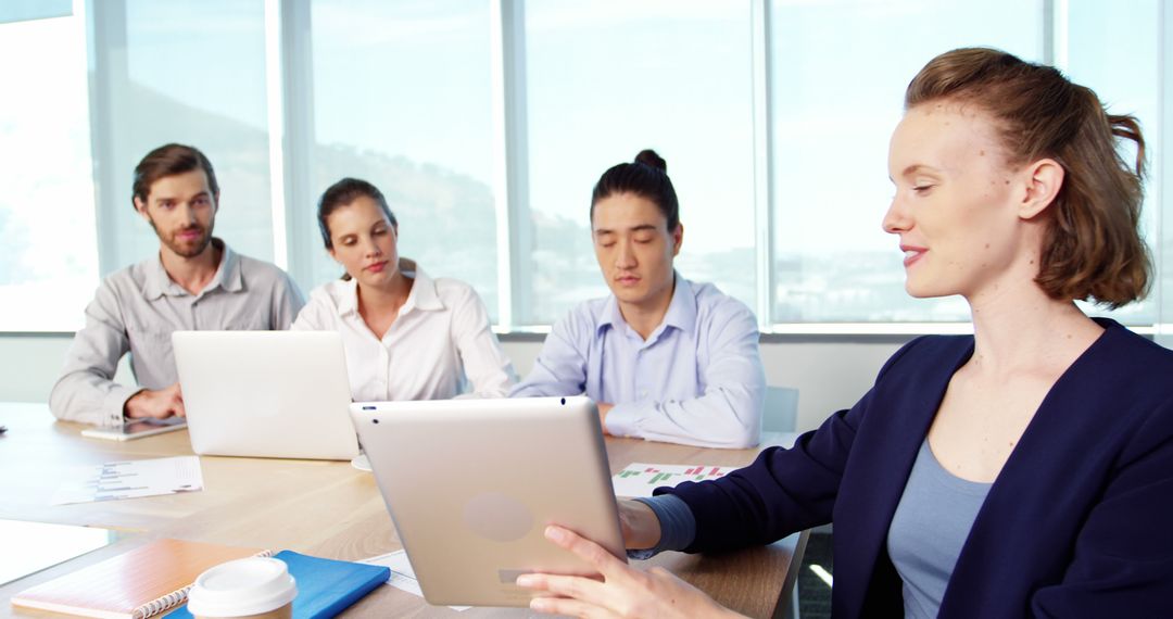 Diverse Business Team Collaborates Over Digital Technology