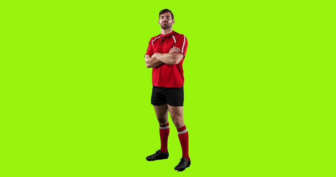 Confident Rugby Player in Red and Black Uniform with Green Background - Free Images, Stock Photos and Pictures on Pikwizard.com