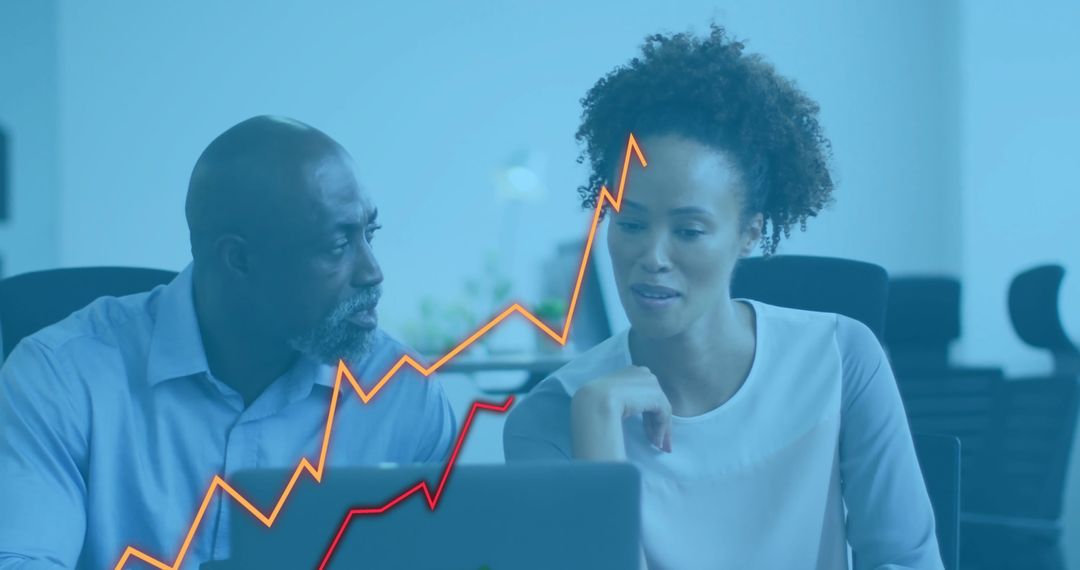 Business Colleagues Discussing Growth with Financial Chart Overlay