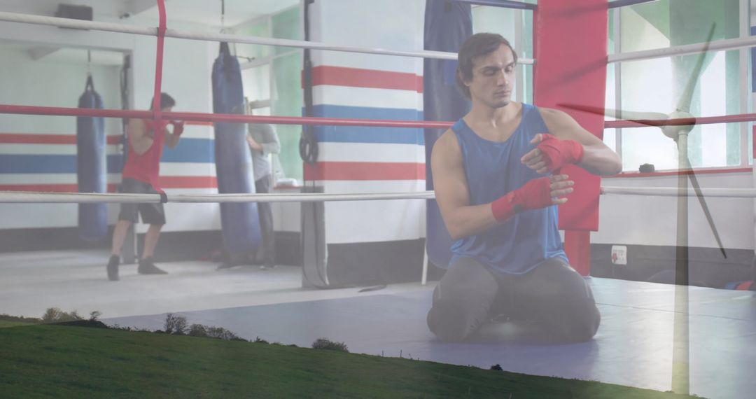 Boxer Preparing in Ring, Securing Red Hand Wraps with Intense Focus