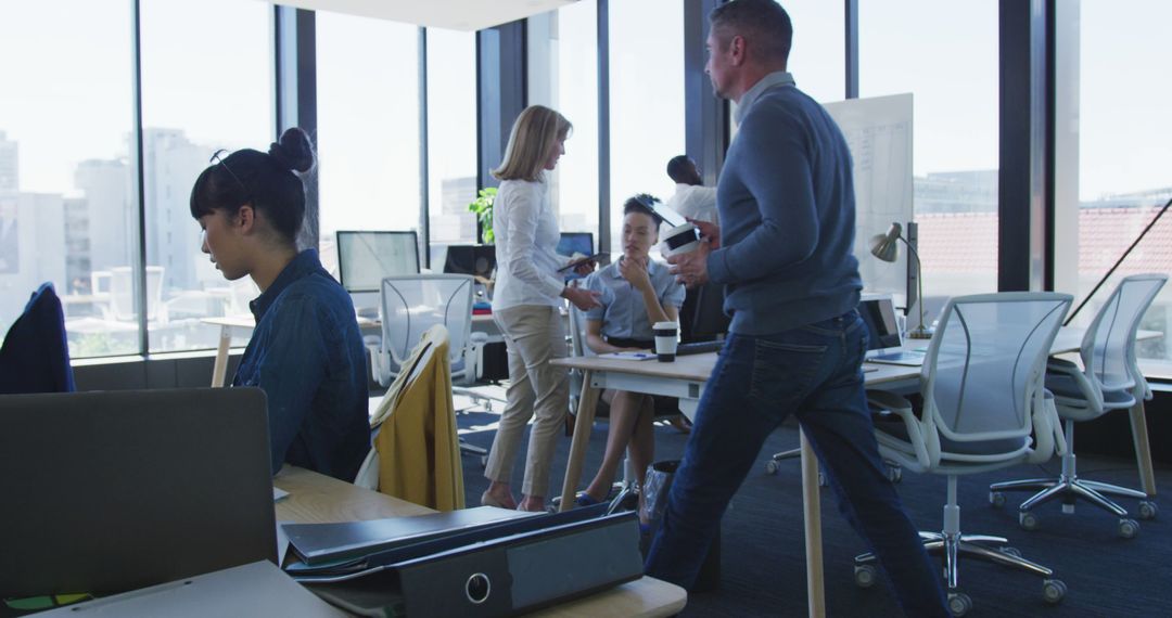 Team Collaboration in Modern Workplace Environment with Natural Light