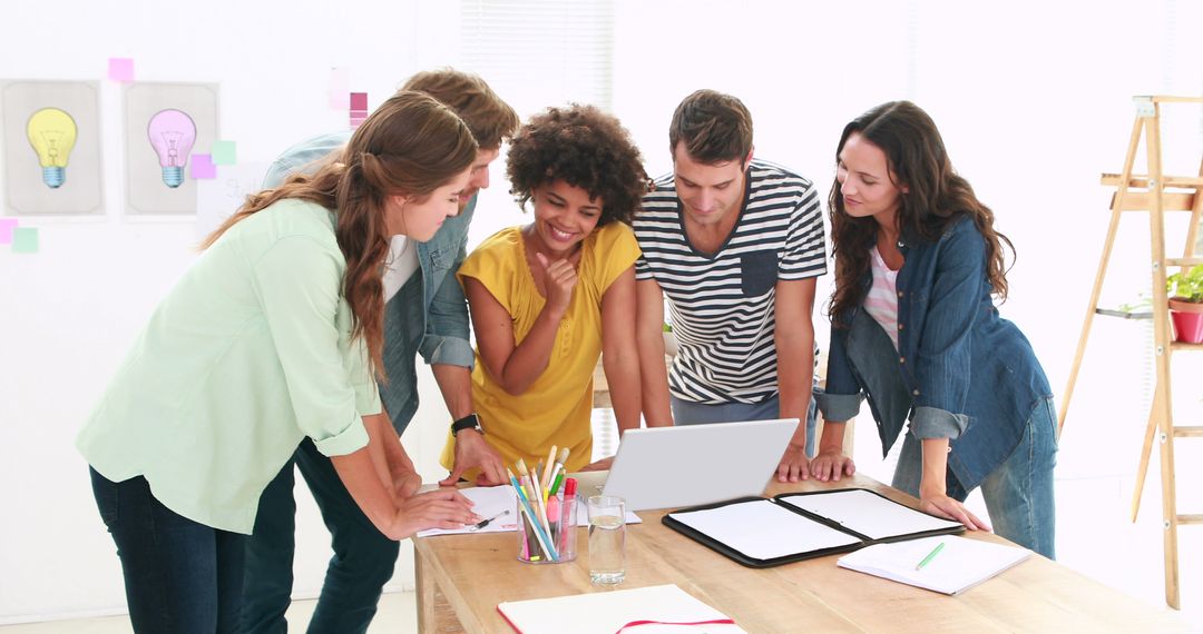 Young Professionals Collaborating in Creative Brainstorming Session