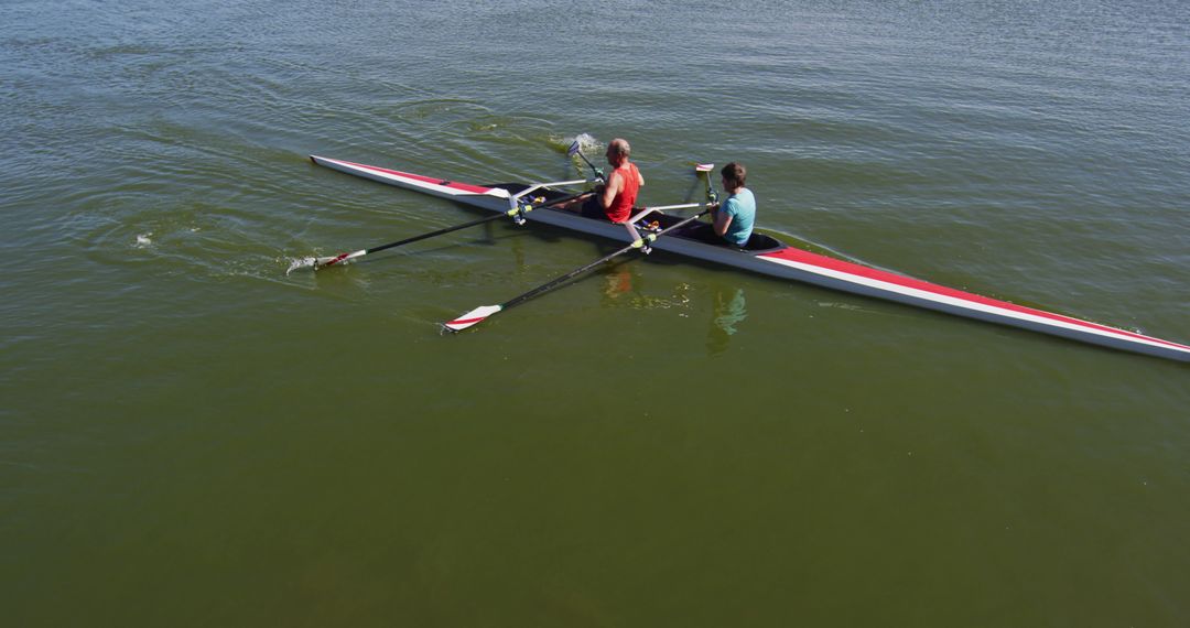 Two Rowers in Double Scull Boat on Peaceful Lake - Free Images, Stock Photos and Pictures on Pikwizard.com