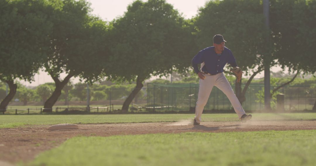 Baseball Player Running on Dusty Field During Daytime - Free Images, Stock Photos and Pictures on Pikwizard.com