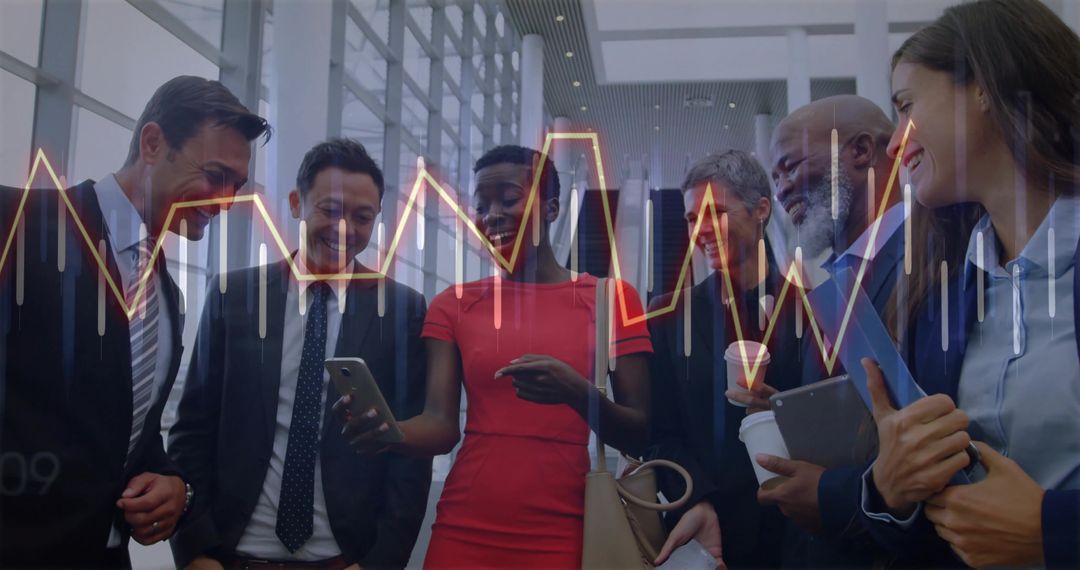 Diverse Business Team Analyzing Data with Digital Devices