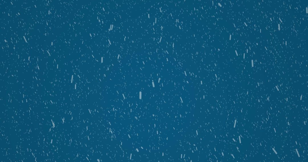 White Particles Falling Against Blue Background