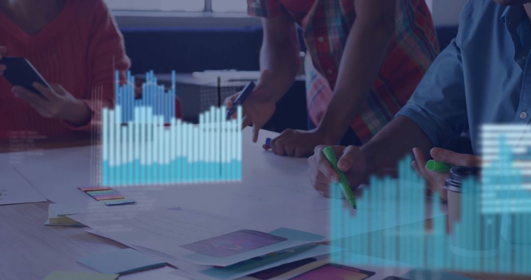 Business Team Analyzing Financial Data Graphics in Modern Office