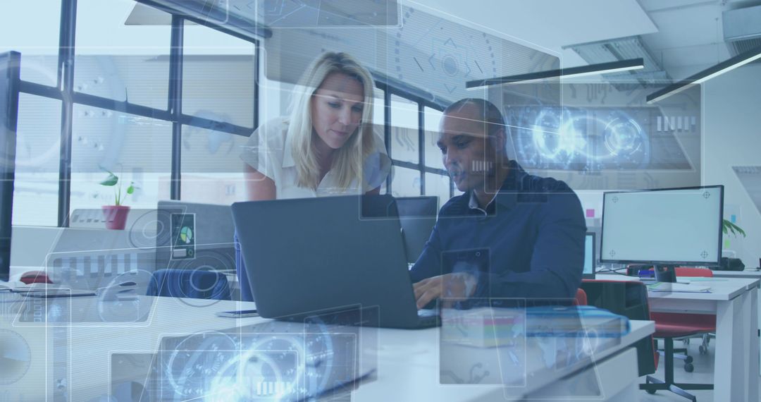 Team Collaborating Over Laptop with Futuristic Holographic Interface in Modern Open Office