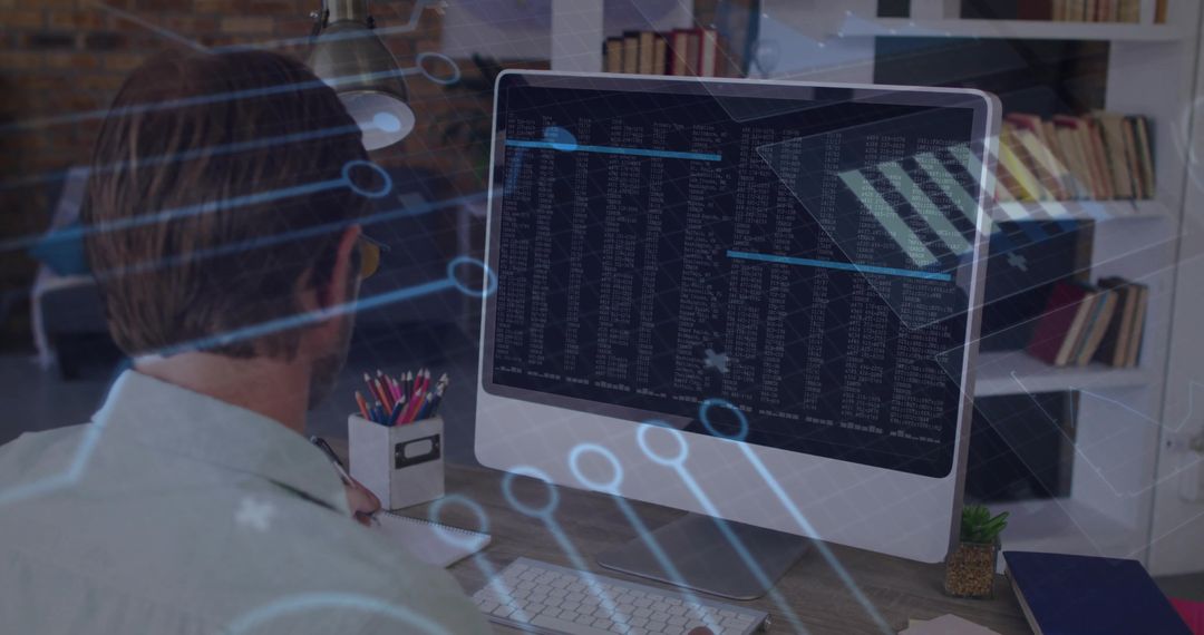 Programmer Coding on Desktop with Futuristic Data Overlay