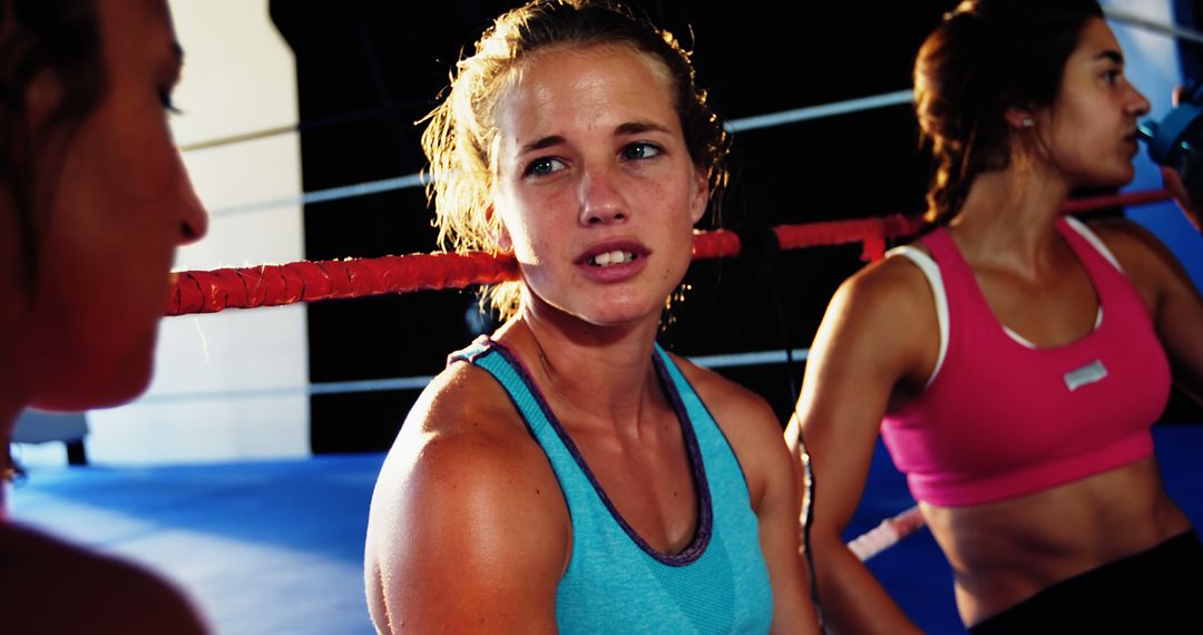 Women Resting After Intense Workout in Boxing Gym - Free Images, Stock Photos and Pictures on Pikwizard.com