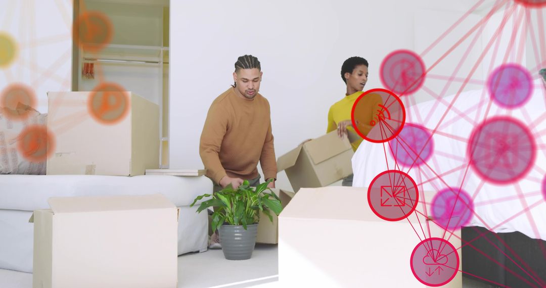 Couple unpacking in bright minimalist living room with houseplant and moving boxes