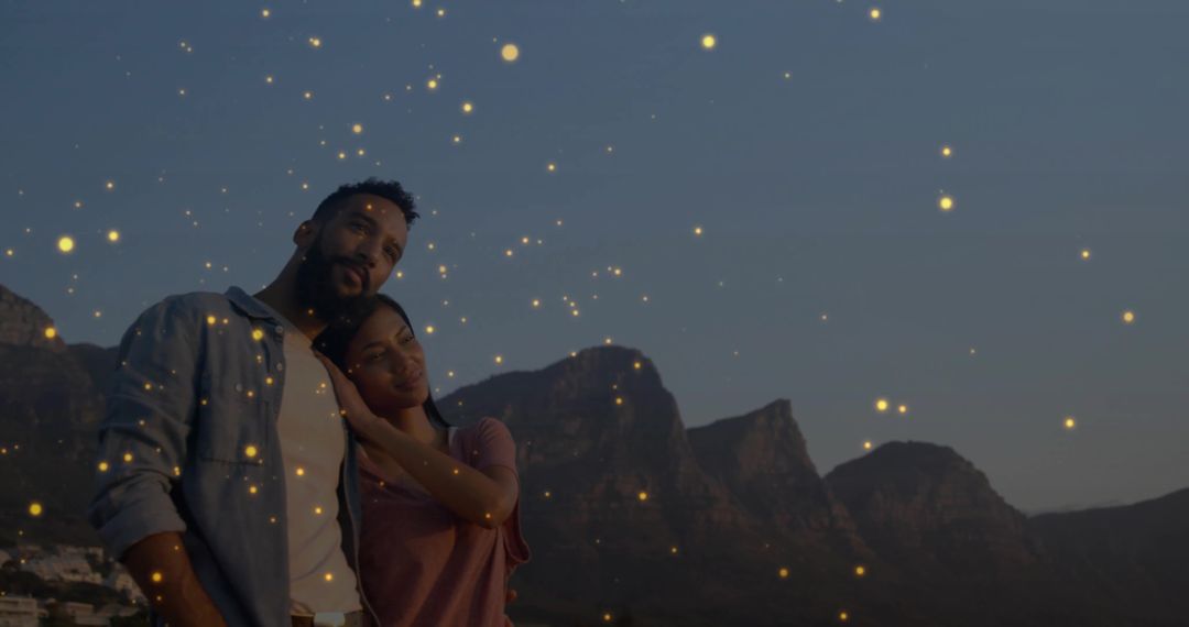 Couple Embracing at Twilight with Sparkling Lights