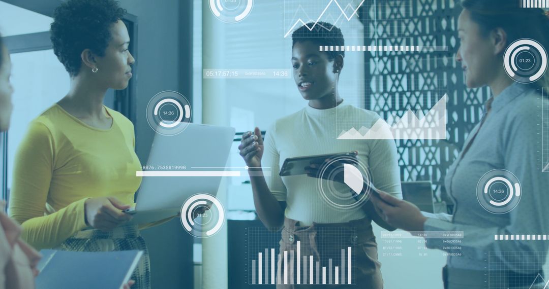 Businesswomen Analyzing Digital Data with Technology Interface