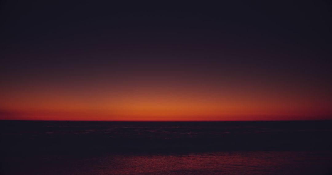 A serene ocean sunset paints the horizon in warm hues - Free Images, Stock Photos and Pictures on Pikwizard.com
