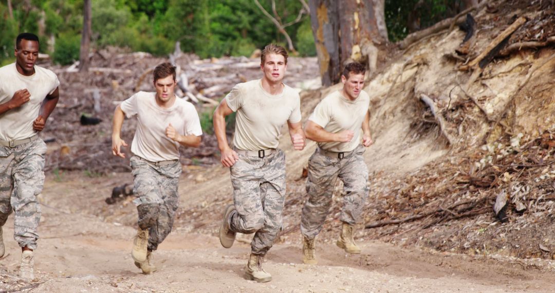 Soldiers Running Endurance Drill Through Rugged Terrain
